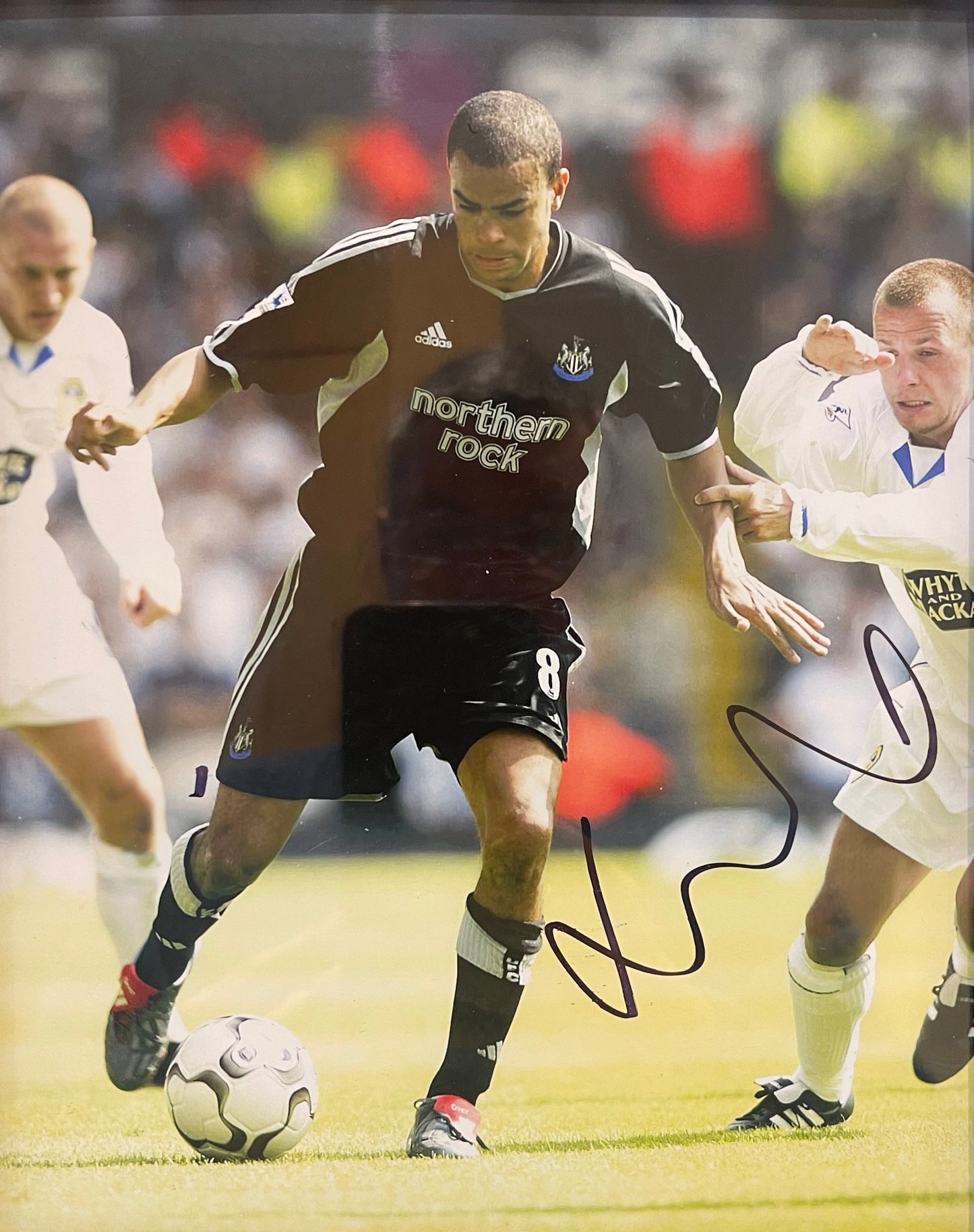 KIERON DYER HAND SIGNED NEWCASTLE UNITED FRAMED PHOTO WITH COA