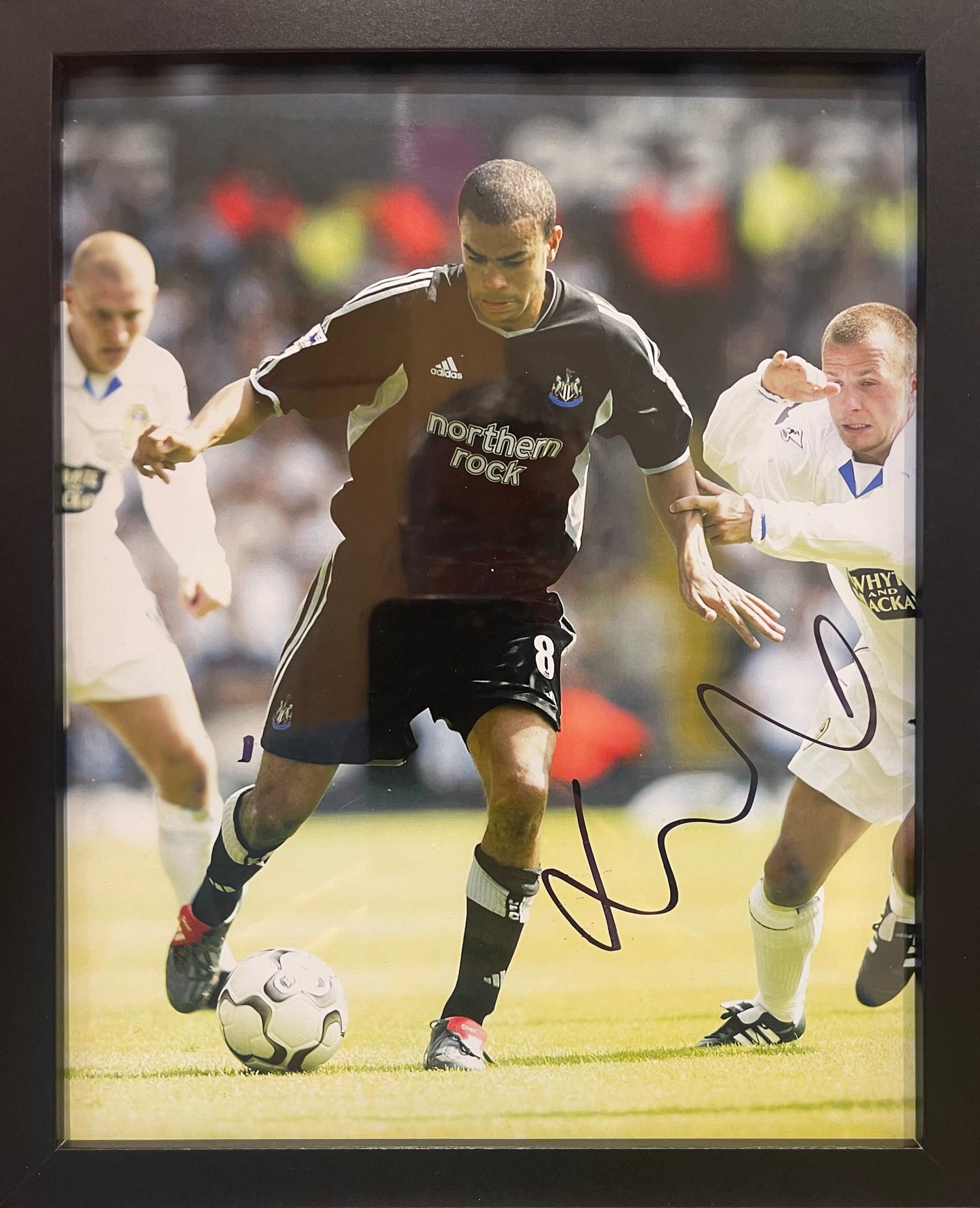 KIERON DYER HAND SIGNED NEWCASTLE UNITED FRAMED PHOTO WITH COA