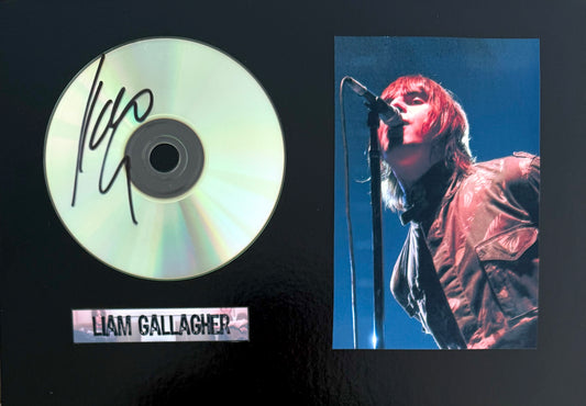 Oasis; Liam Gallagher, Hand Signed Compact Disc, Photo Presentation & UACC COA