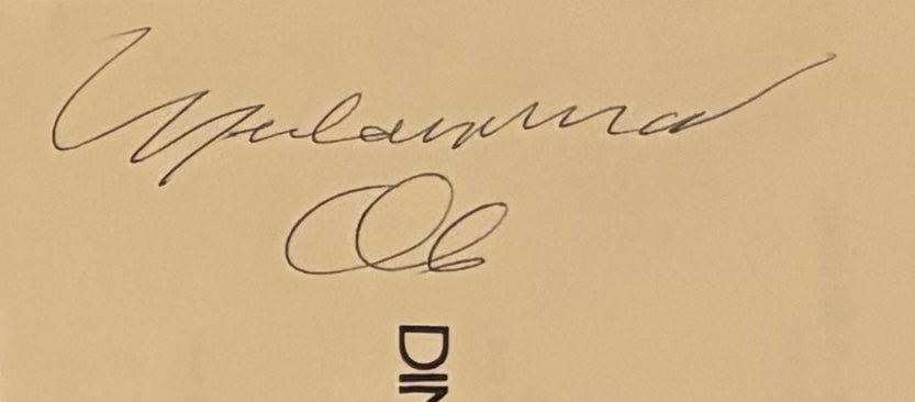 Muhammad Ali, 'The Greatest'. Hand Signed Mounted Dinner Menu Presentation & COA