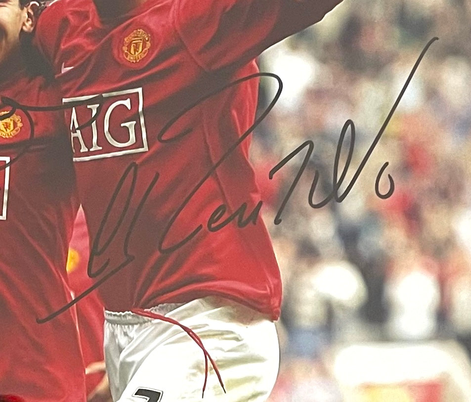 CRISTIANO RONALDO AND CARLOS TEVEZ HAND SIGNED MANCHESTER UNITED PHOTO & COA