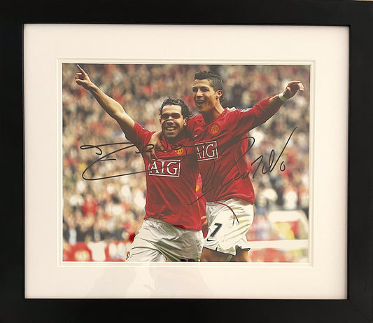 CRISTIANO RONALDO AND CARLOS TEVEZ HAND SIGNED MANCHESTER UNITED PHOTO & COA