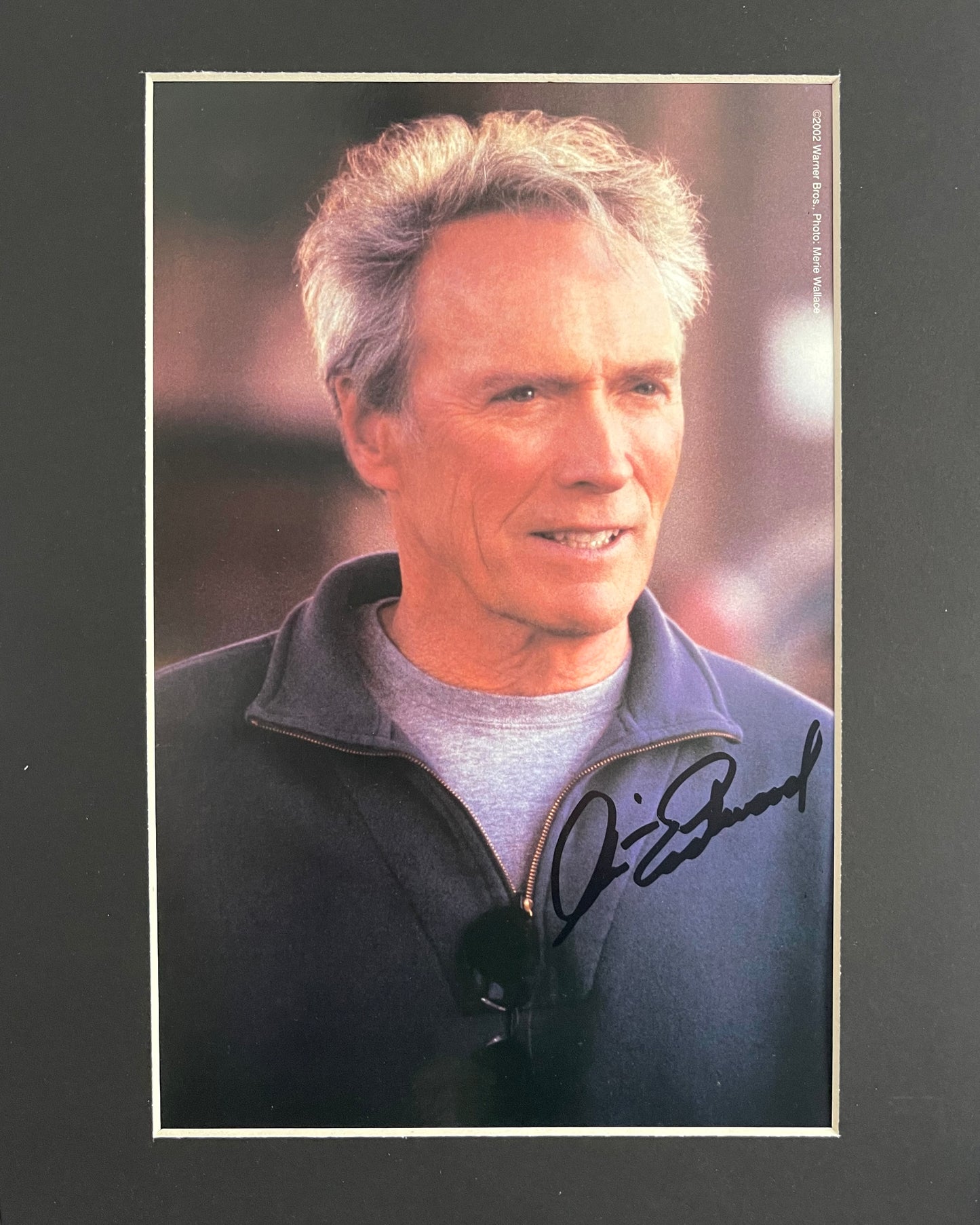 CLINT EASTWOOD HAND SIGNED PUBLICITY PHOTO (10' INCH X 8' INCH) FRAMED WITH AFTAL COA