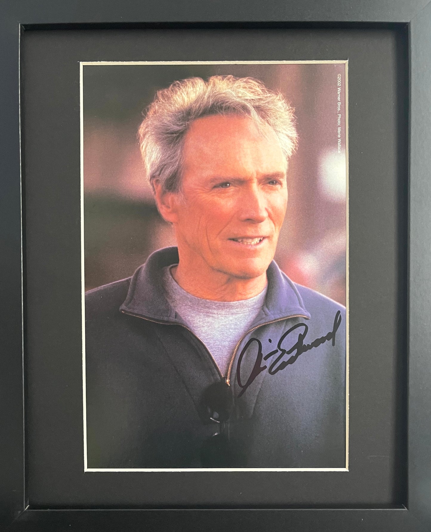 CLINT EASTWOOD HAND SIGNED PUBLICITY PHOTO (10' INCH X 8' INCH) FRAMED WITH AFTAL COA