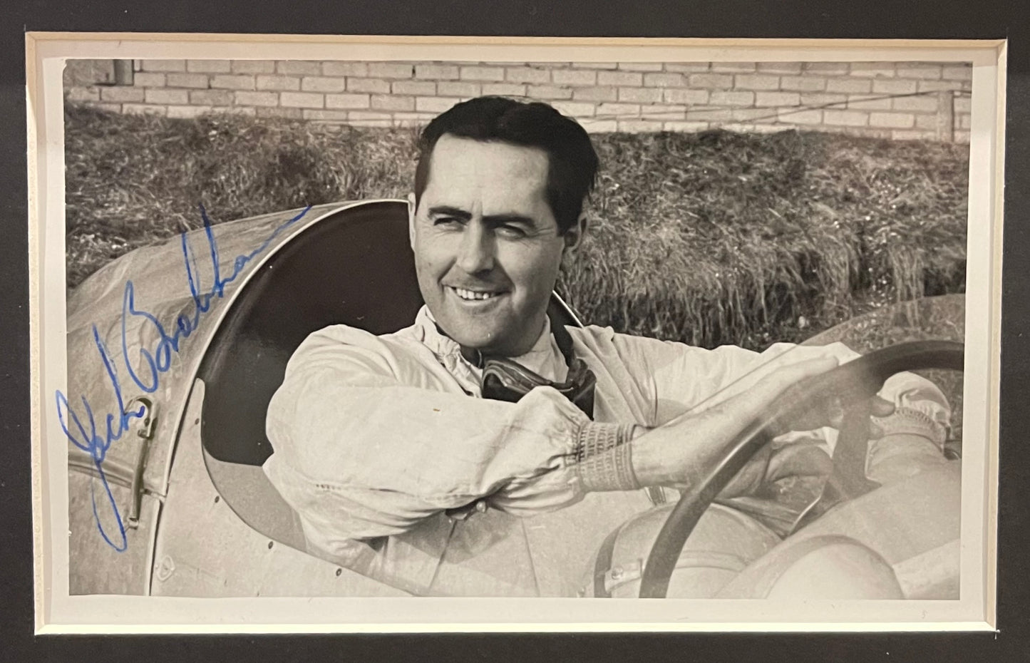 SIR JACK BRABHAM FORMULA 1 WORLD CHAMPION HAND SIGNED ORIGINAL PHOTO WITH COA