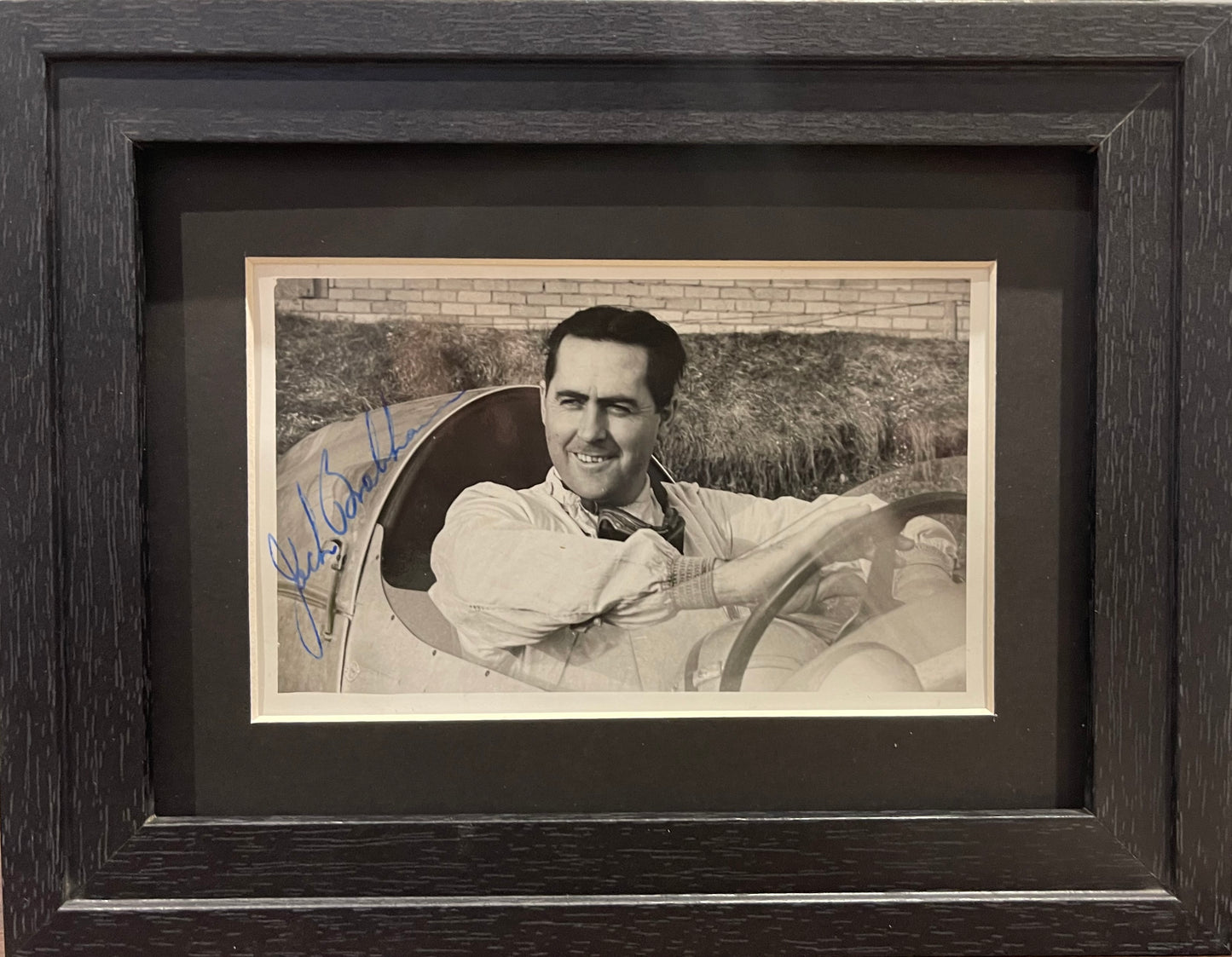 SIR JACK BRABHAM FORMULA 1 WORLD CHAMPION HAND SIGNED ORIGINAL PHOTO WITH COA